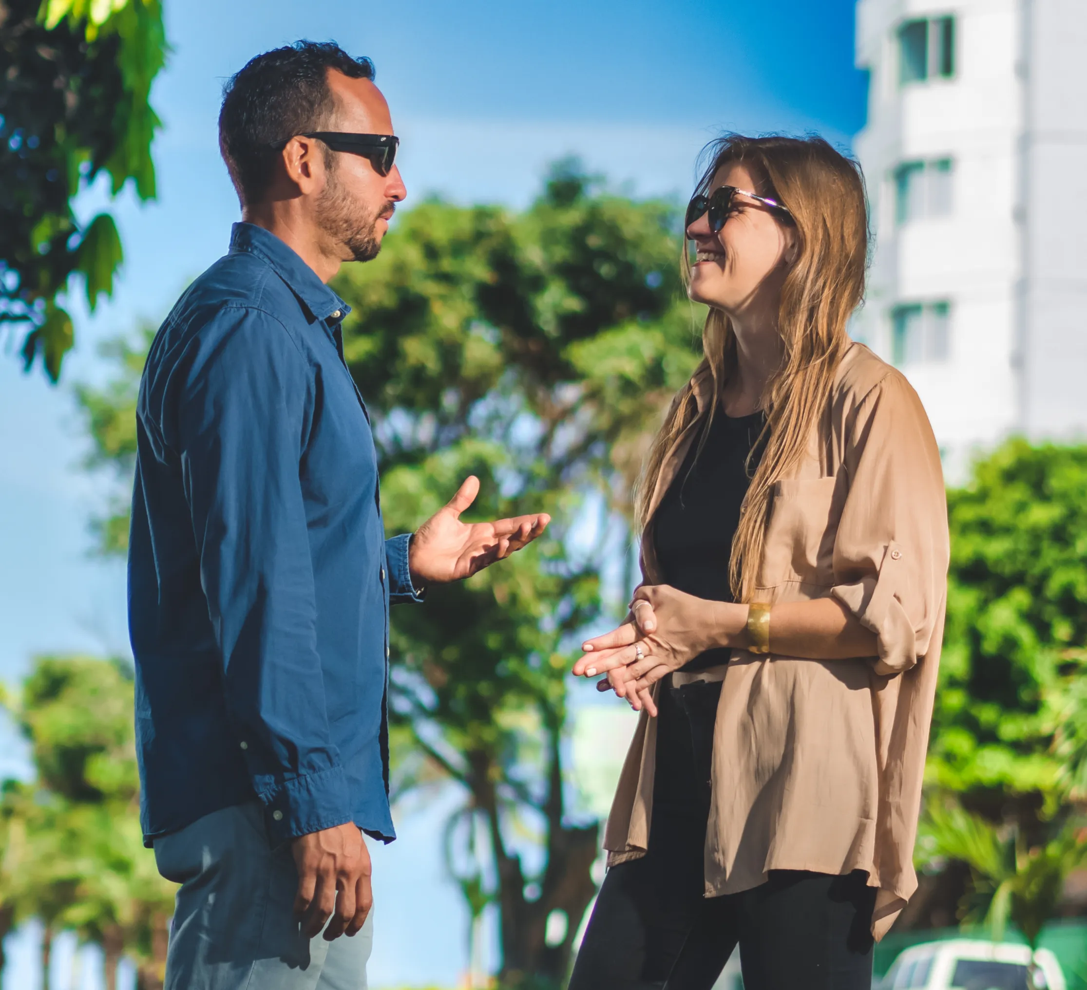 Nadine Flexhaug coaching a student in conversation outdoors